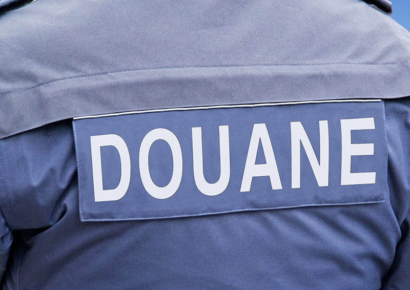 Agent / Agente de constatation des douanes